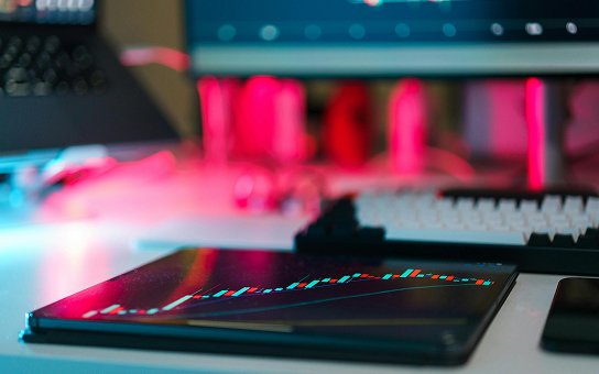 tablet showing graph in neon colors